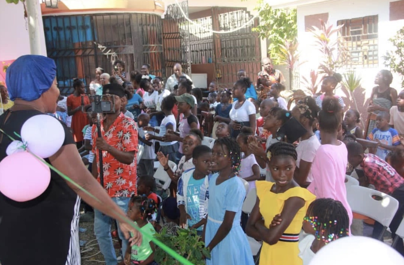 Children and adults gather during a Foundation community event.