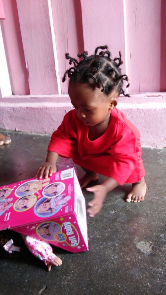 A young child using an educational learning toy